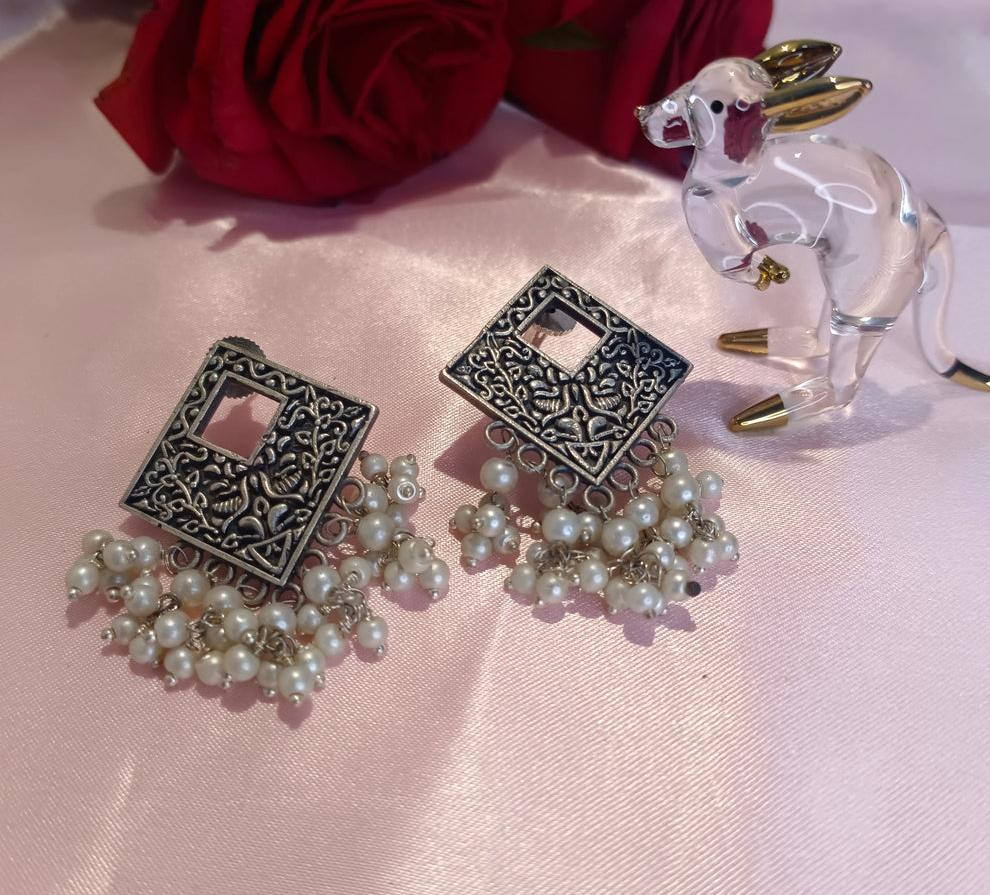 Silver lookalike earrings 